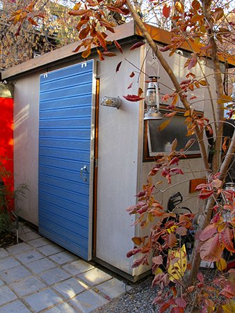 Conception et construction d'un atelier-cabanon intégrant une palissade
