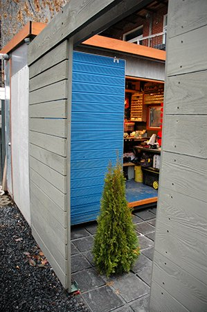 Conception et construction d'un atelier-cabanon intégrant une palissade