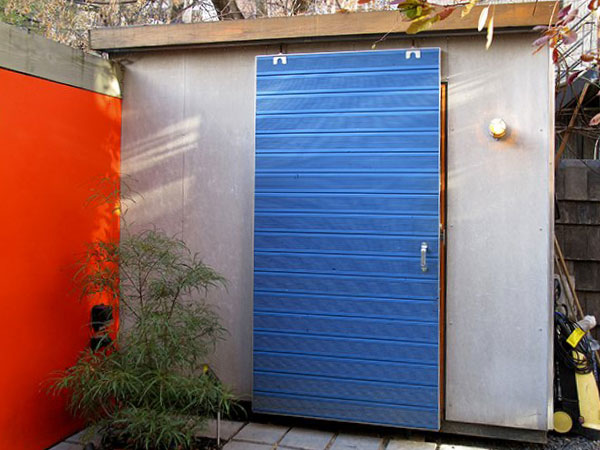 Conception et construction d'un atelier-cabanon intégrant une palissade