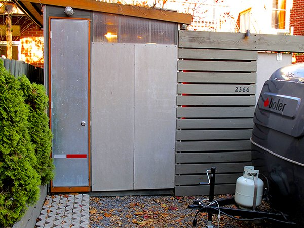 Conception et construction d'un atelier-cabanon intégrant une palissade